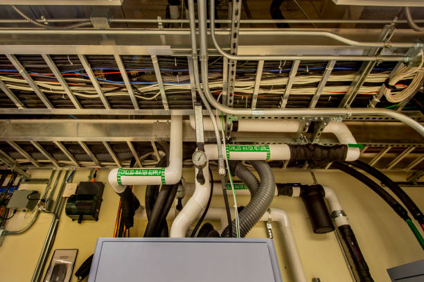 Inverter room with labeled conduits and neat cabling