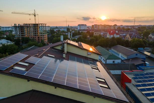 Residential rooftop arrays at sunset